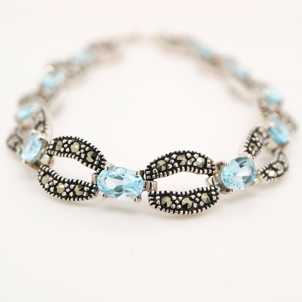Blue topaz and marcasite bracelet in sterling silver