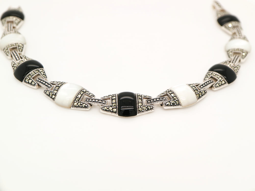 Onyx and mother of pearl art deco bracelet in sterling silver with marcasite
