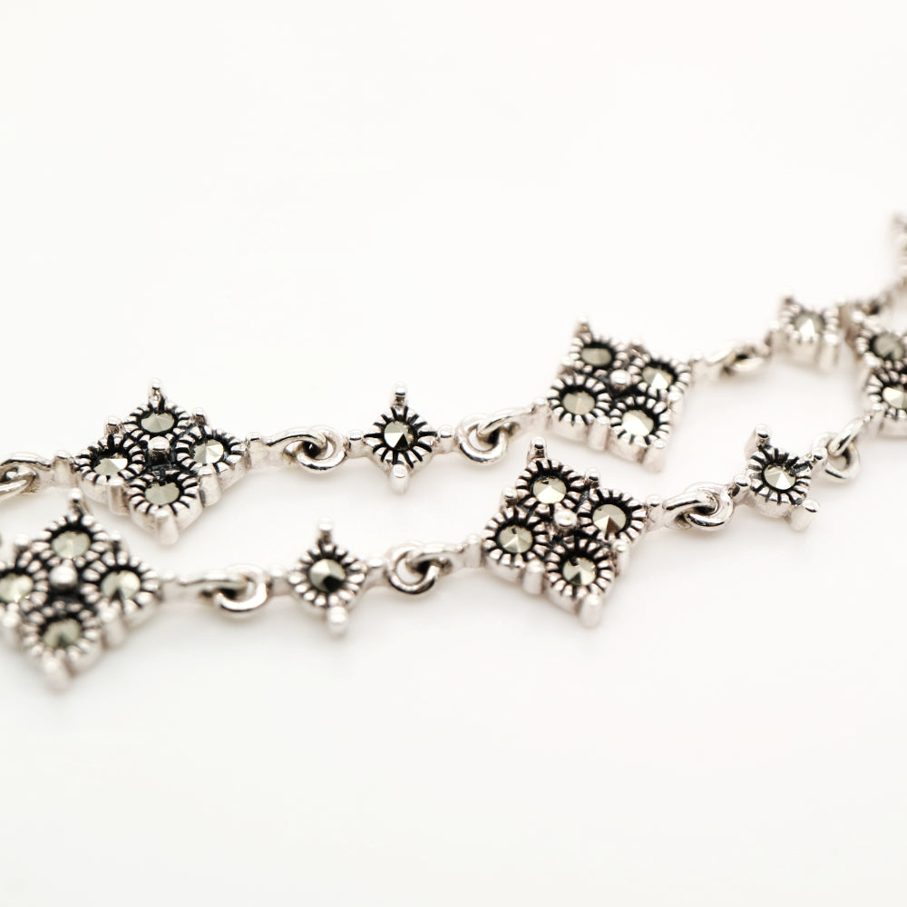Marcasite bracelet with signature lozenge in sterling silver