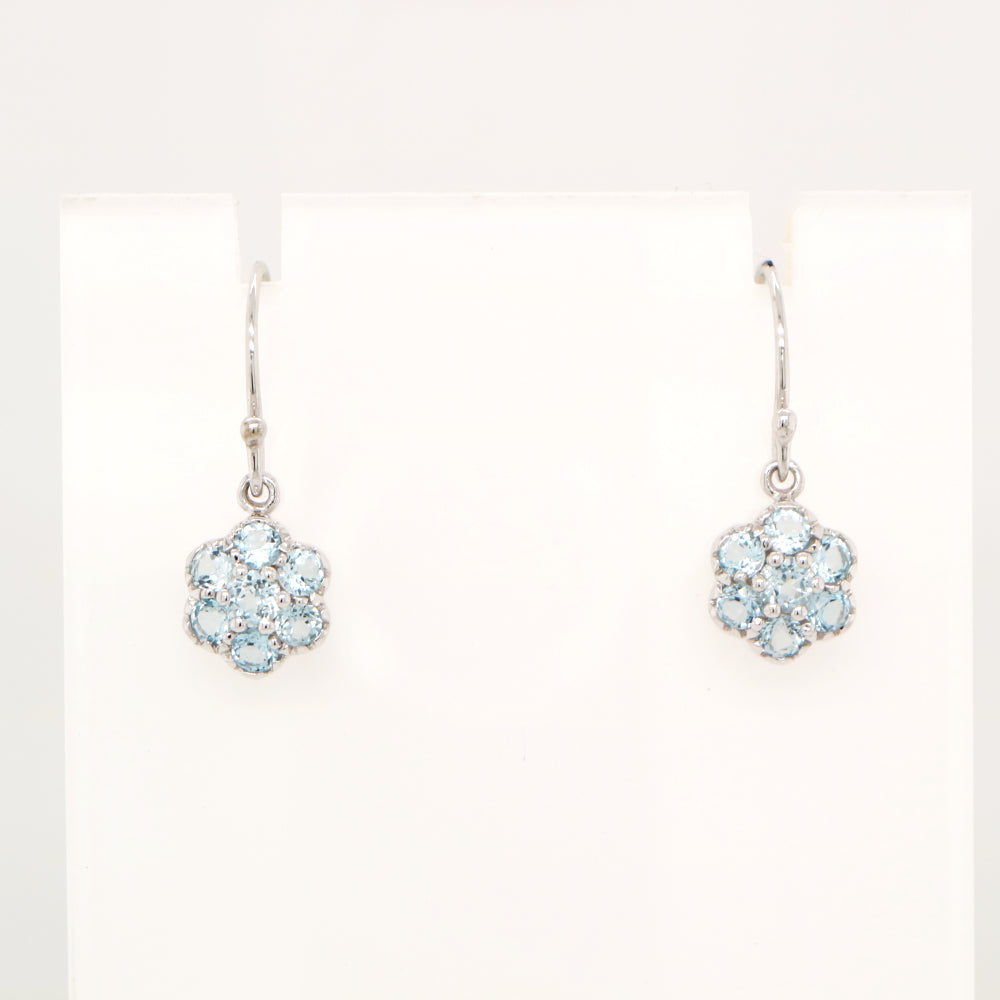 Daisy hook earrings with blue topaz in 9k White gold