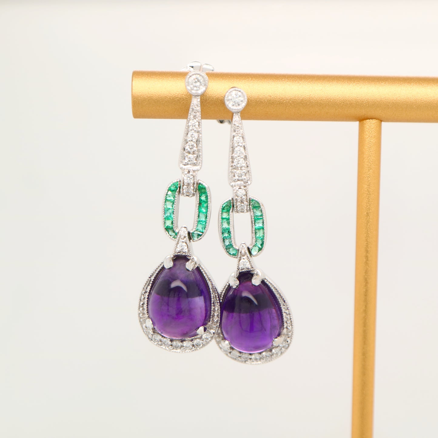 Art deco amethyst drop earrings with natural diamond and emeralds in 9k white gold