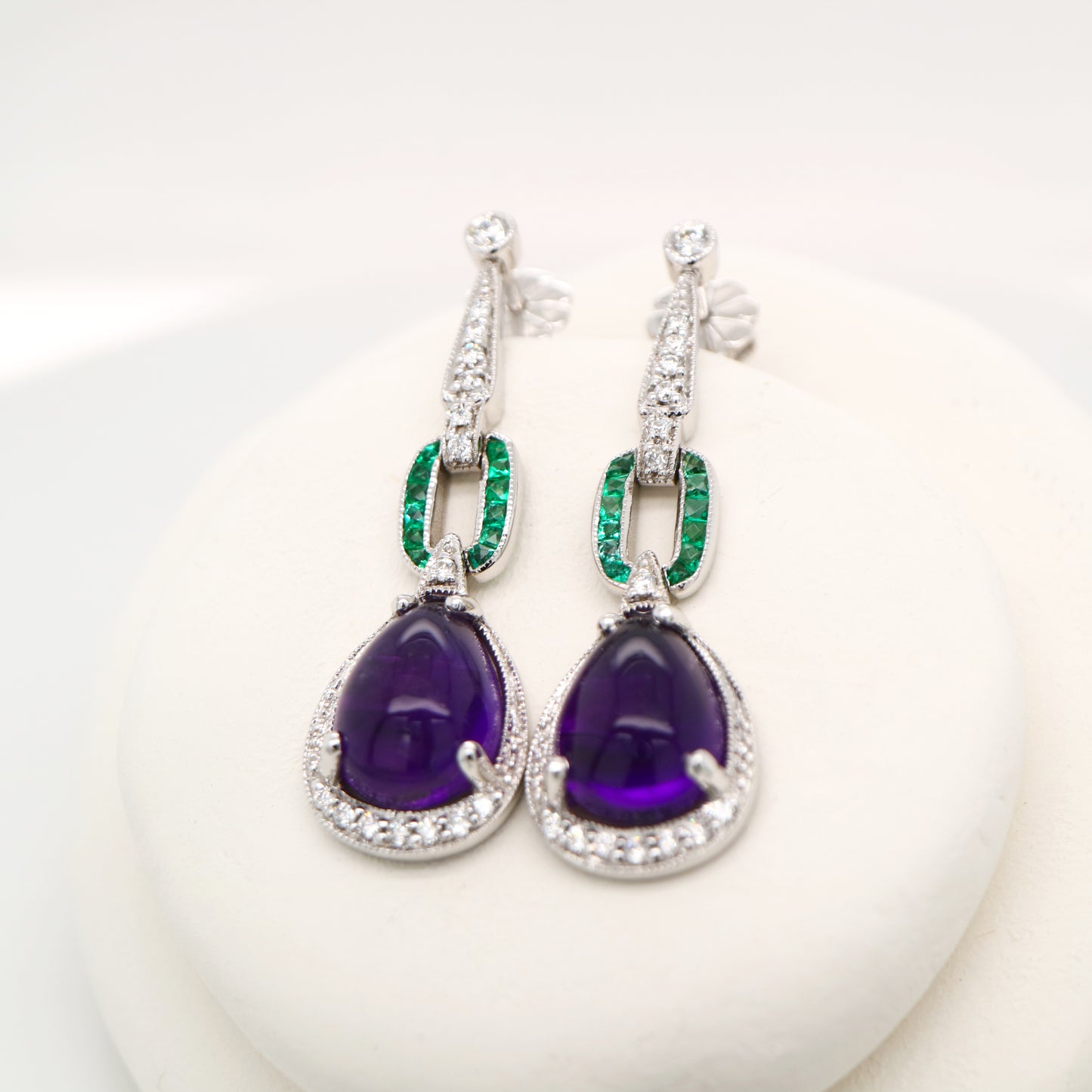 Art deco amethyst drop earrings with natural diamond and emeralds in 9k white gold