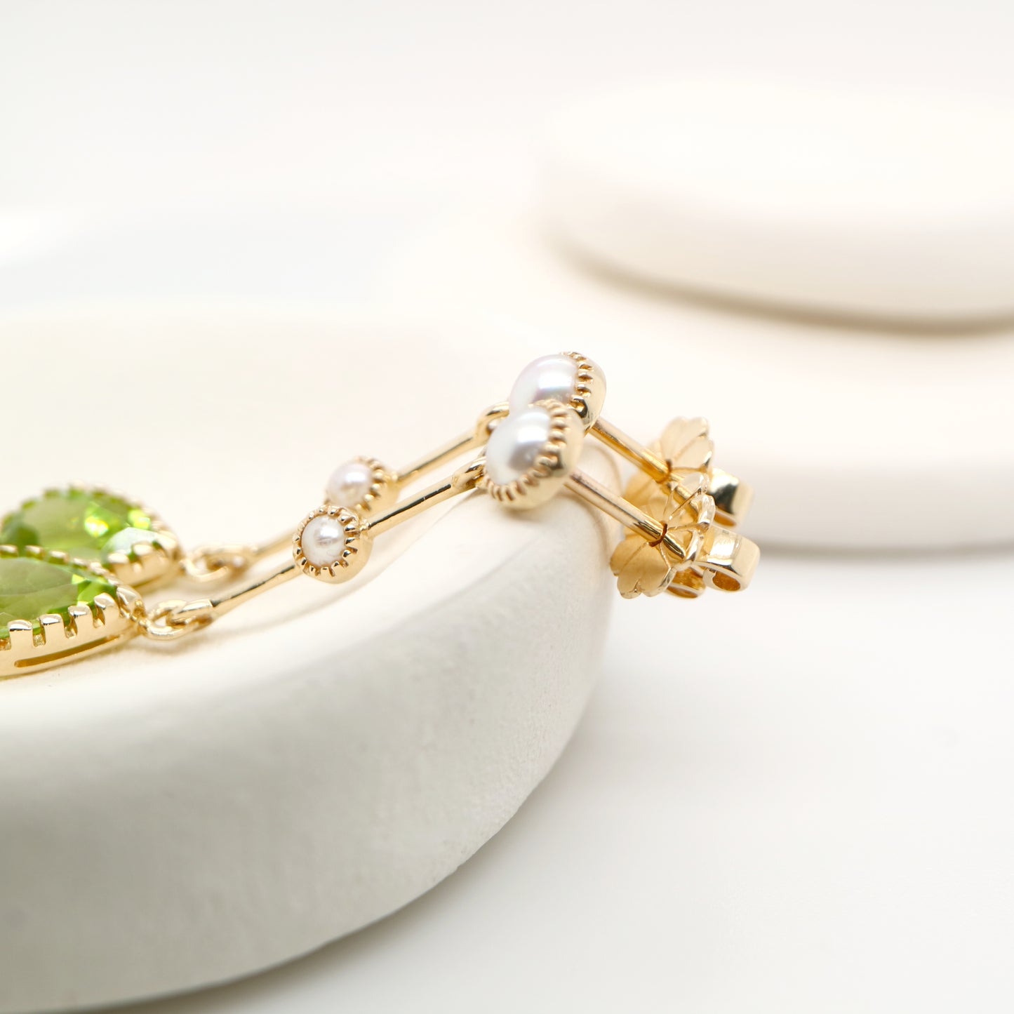 Freshwater pearl with peridot drop earrings in 9k yellow gold