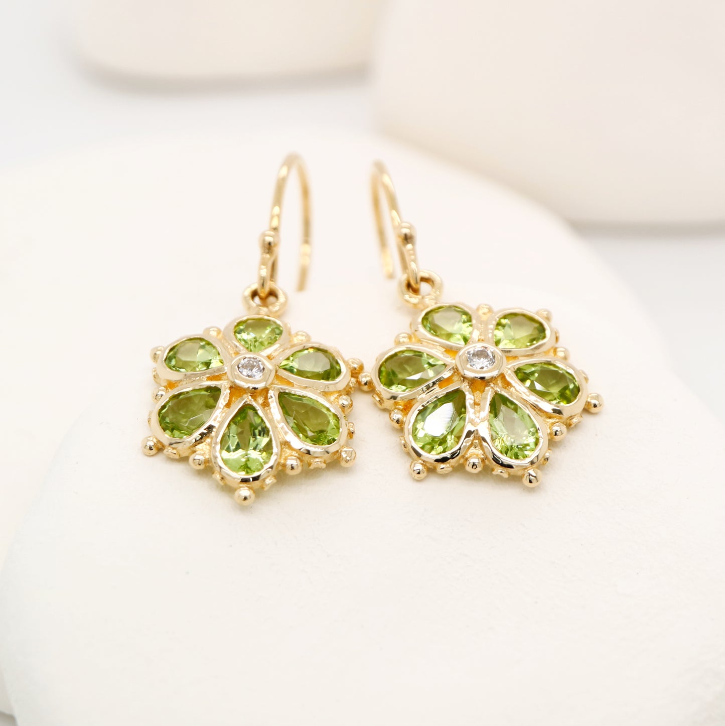 Peridot petal flower earrings with natural diamond in 9k yellow gold