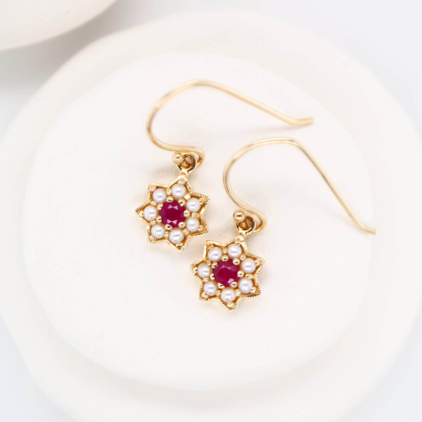 Star earring with Ruby and Pearl in 9k Yellow gold