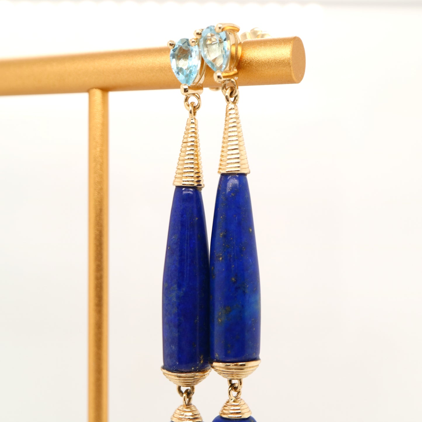 Natural lapis and blue topaz stud earrings in 9k yellow gold