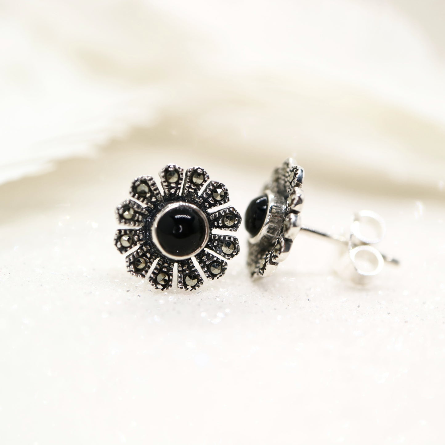 Flower stud earrings in onyx, marcasite and sterling silver