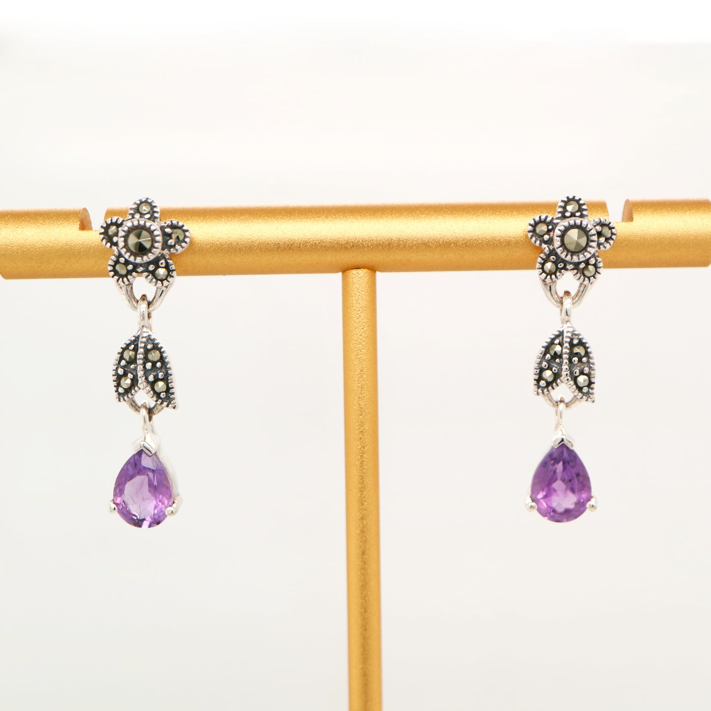 Marcasite flower earrings with amethyst drop in silver