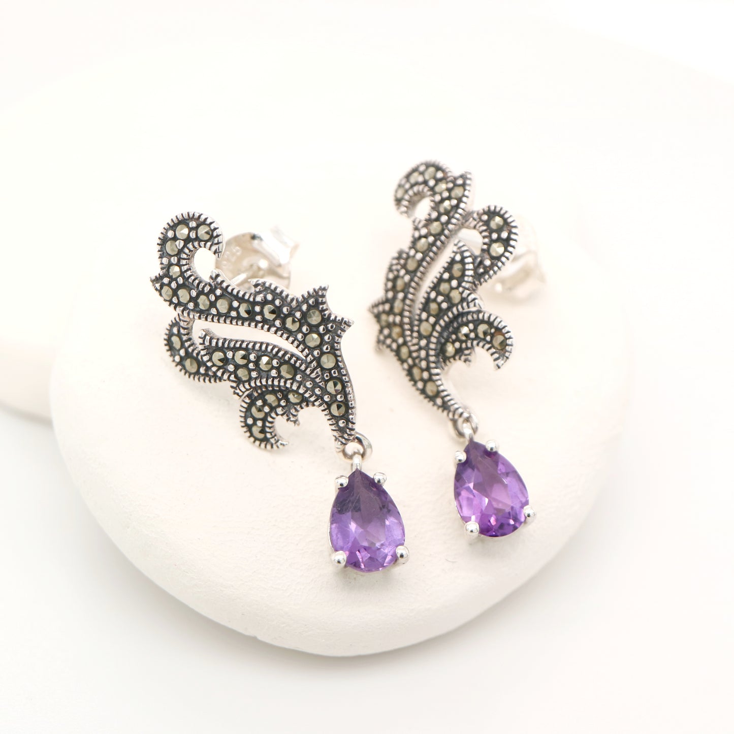 Marcasite feather earring with amethyst in sterling silver