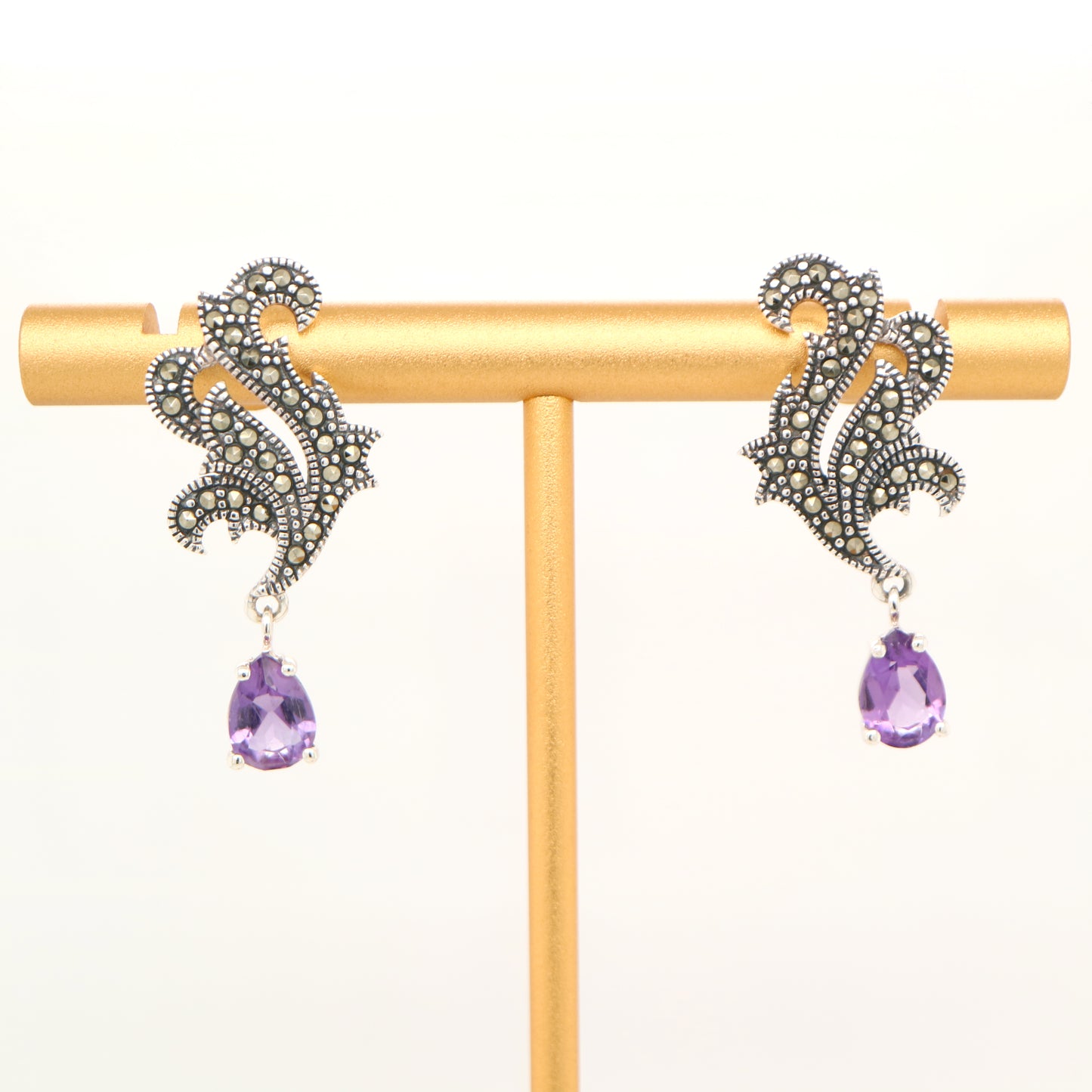 Marcasite feather earring with amethyst in sterling silver