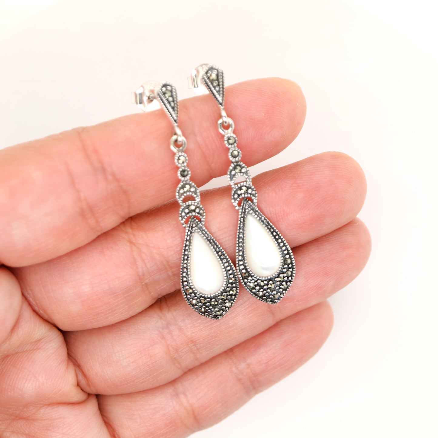 Mother of pearl drop earrings with marcasite in sterling silver