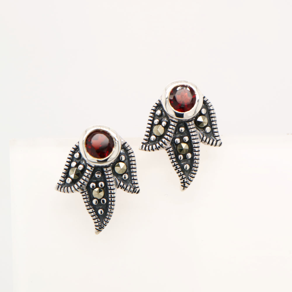 Garnet with marcasite feathers in sterling silver