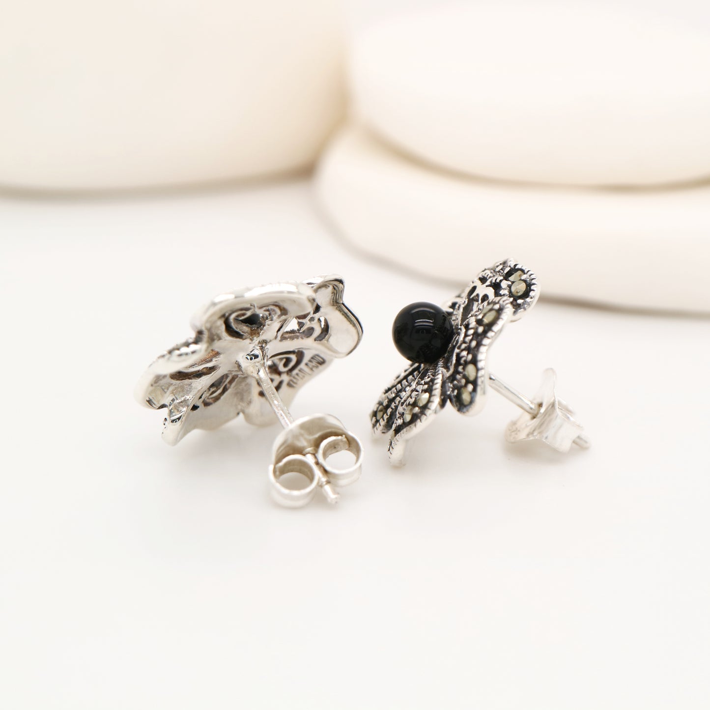 5 petal flower stud earrings with marcasite and onyx in sterling silver