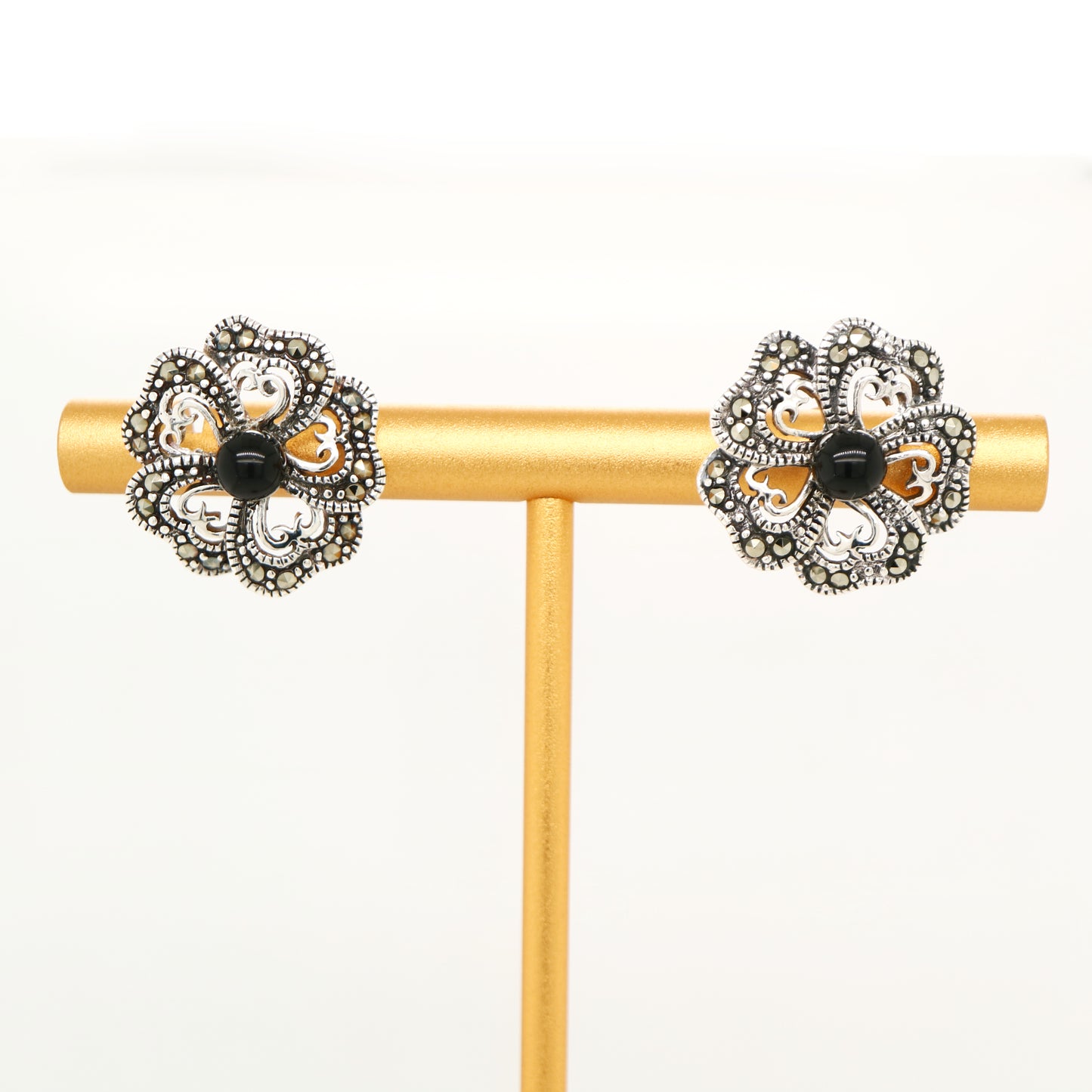 5 petal flower stud earrings with marcasite and onyx in sterling silver