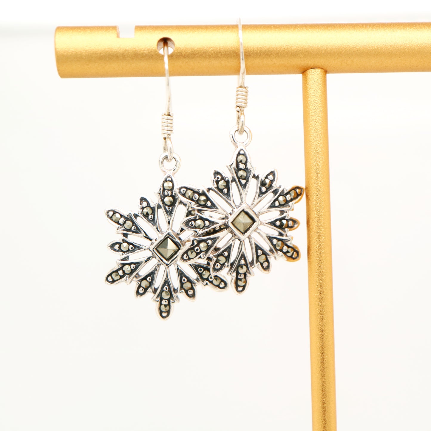 Starburst snowflake earrings with marcasite in sterling silver