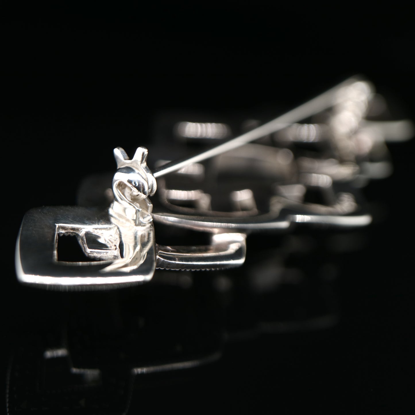 Art deco tesselated brooch with marcasite and onyx in sterling silver