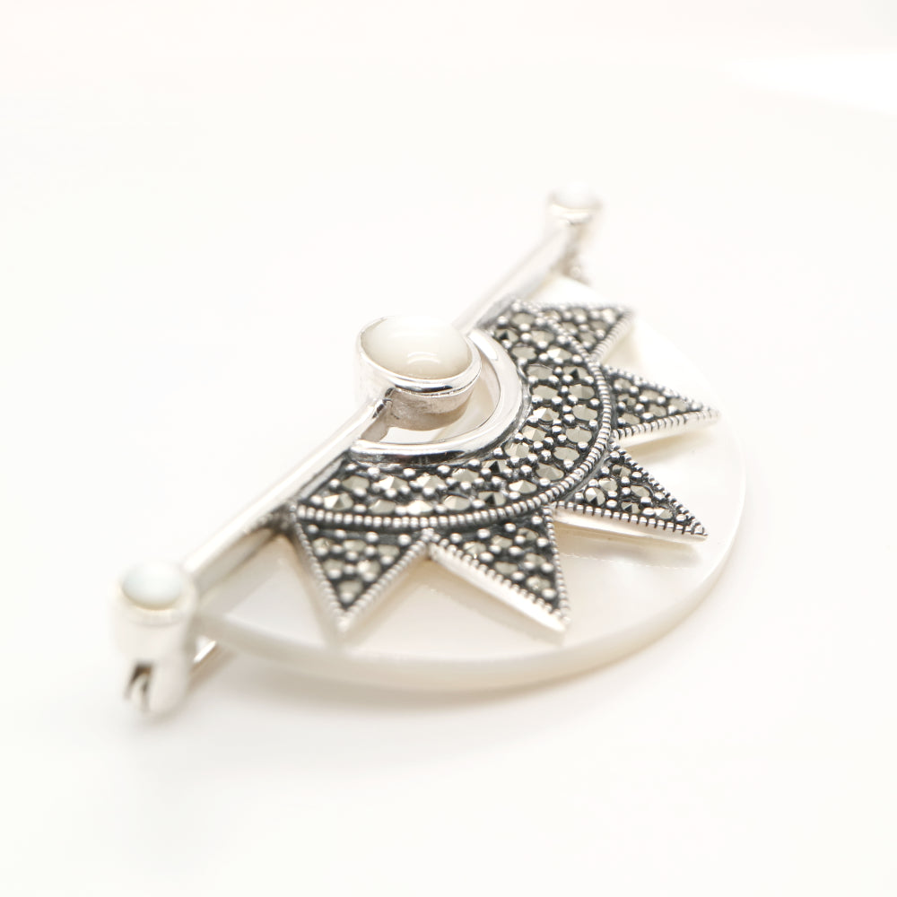Art deco mother of pearl fan brooch with marcasite in sterling silver