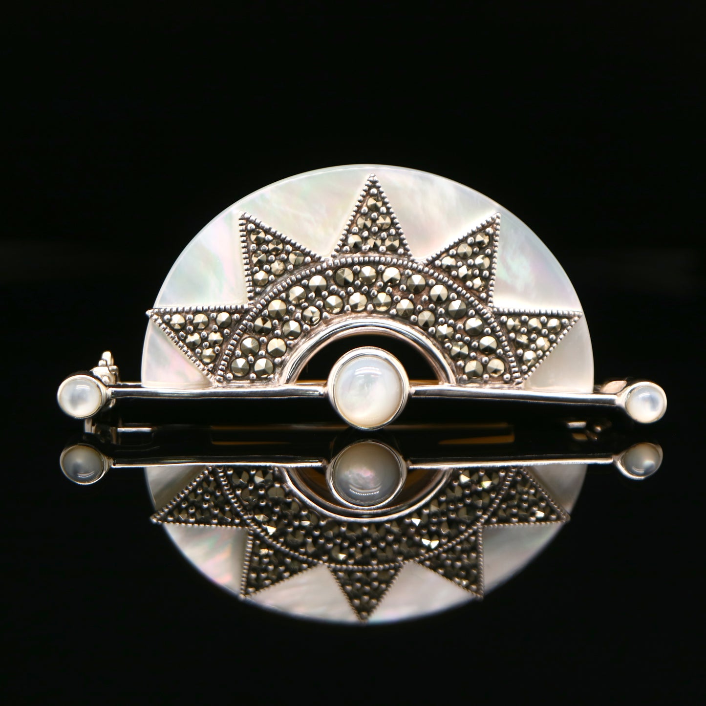 Art deco mother of pearl fan brooch with marcasite in sterling silver