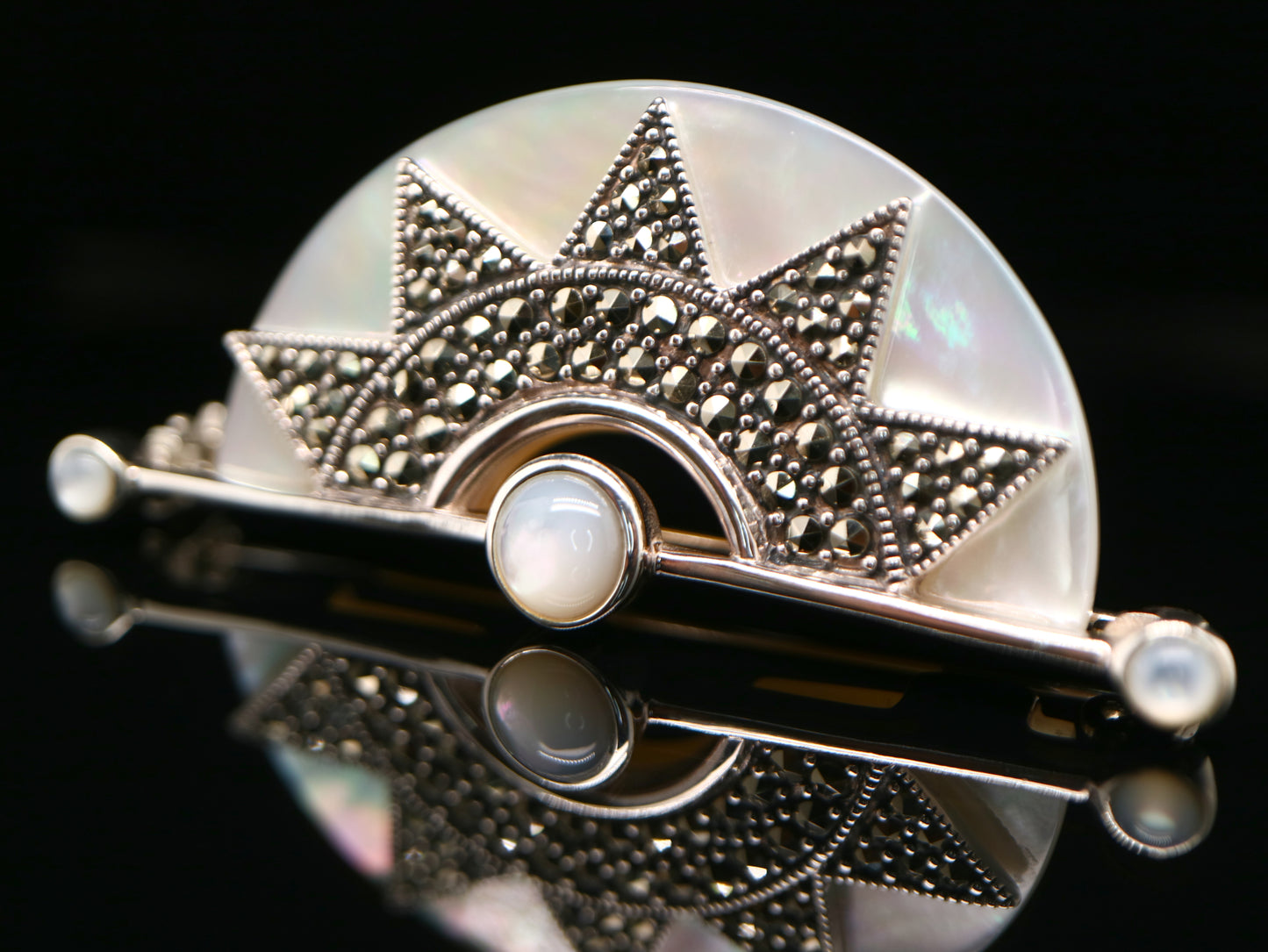 Art deco mother of pearl fan brooch with marcasite in sterling silver