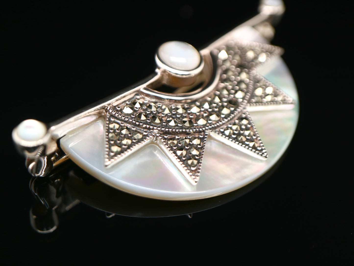 Art deco mother of pearl fan brooch with marcasite in sterling silver