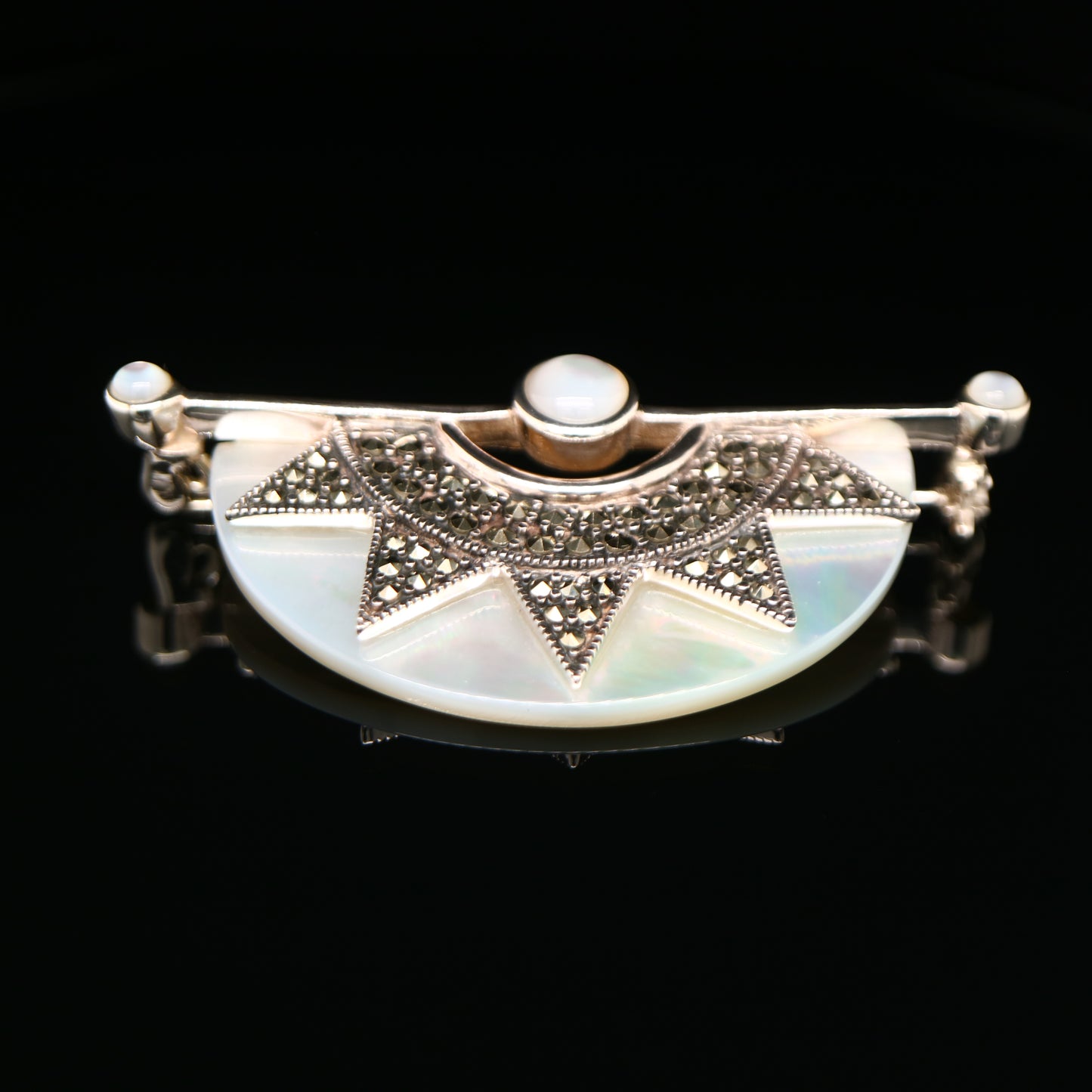 Art deco mother of pearl fan brooch with marcasite in sterling silver