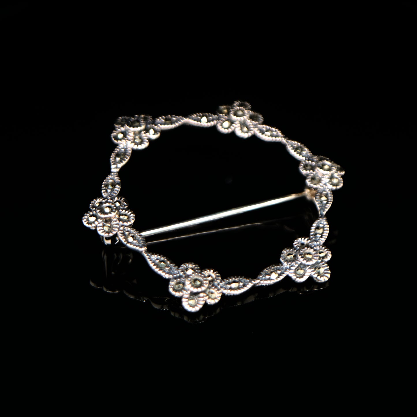 Flower hoop brooch in marcasite and silver