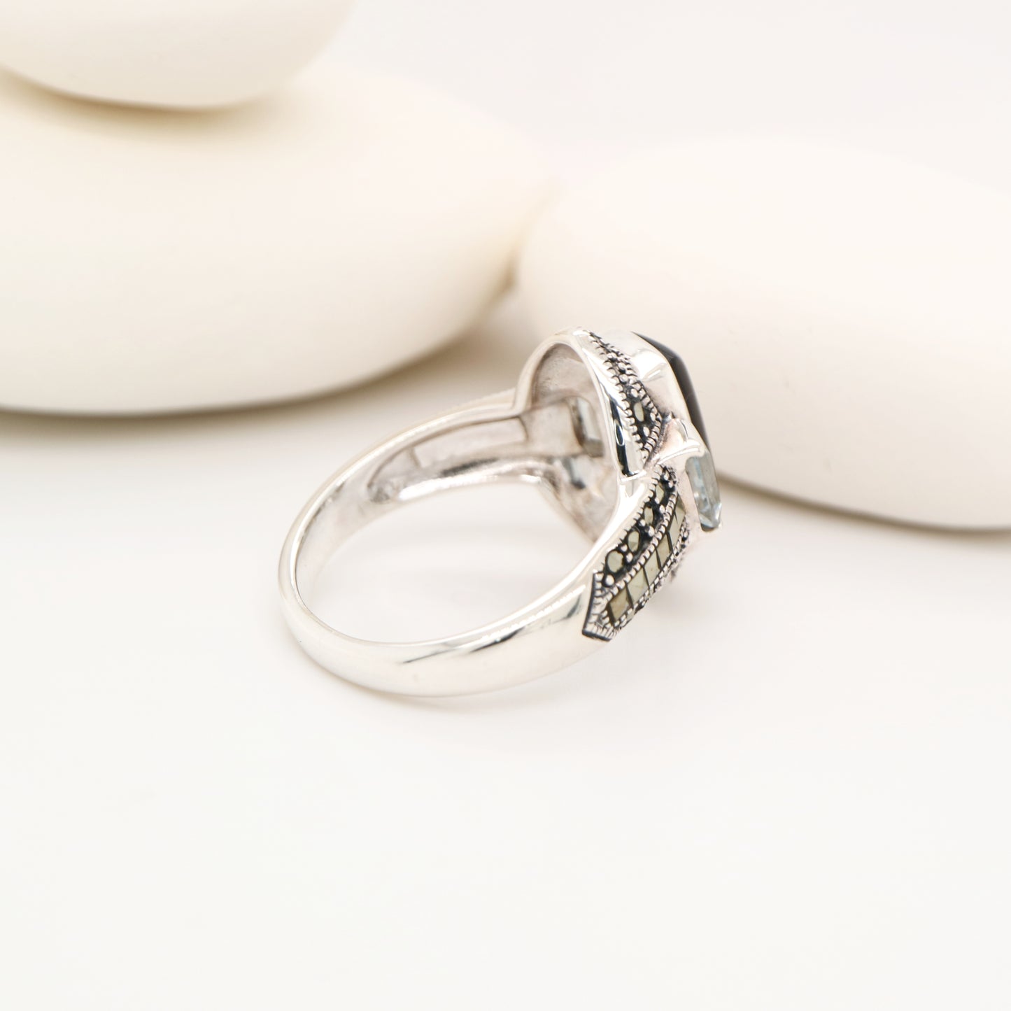 Silver lipped grey shell and pale blue topaz ring with marcasite and sterling silver