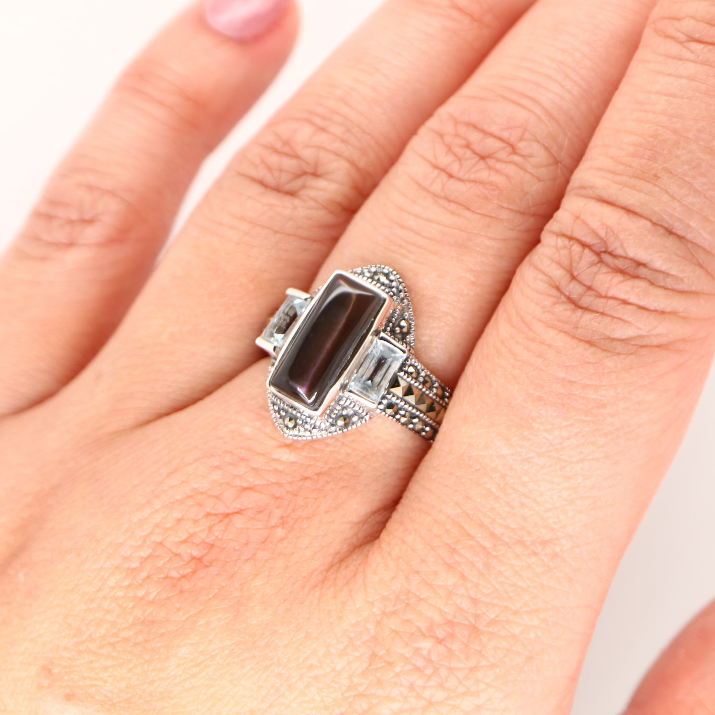 Silver lipped grey shell and pale blue topaz ring with marcasite and sterling silver