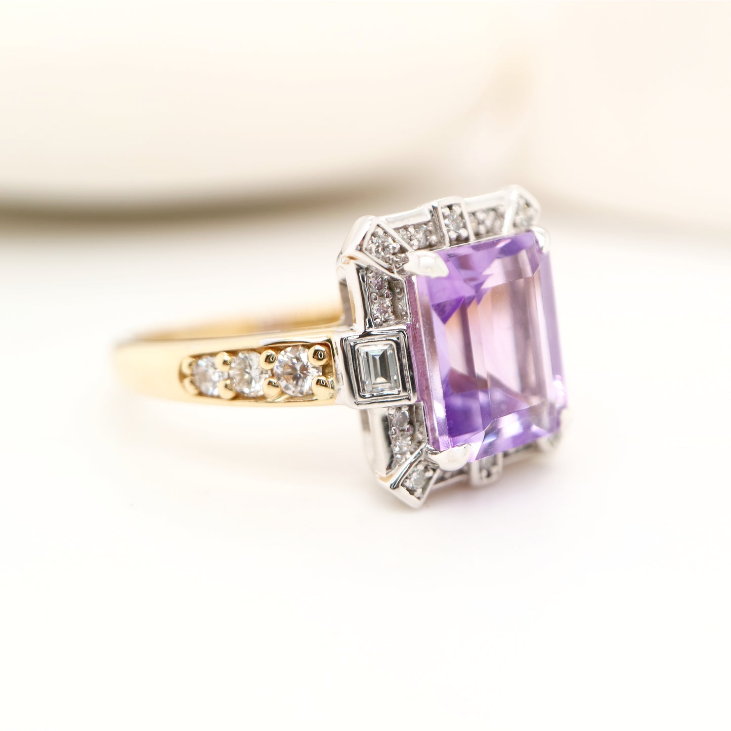 Bi-color gold cocktail ring with amethys and laboratory grown diamond