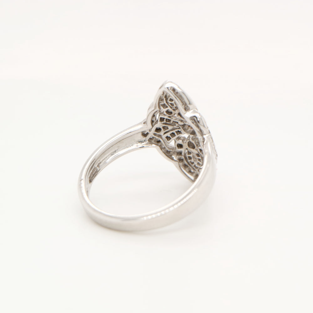 Vintage filigree shield ring in white gold with natural diamonds