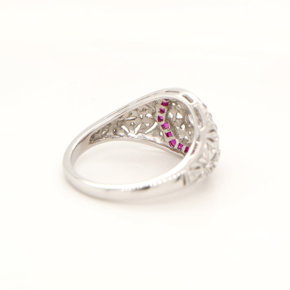 Art deco white gold ring with diamond and ruby halo