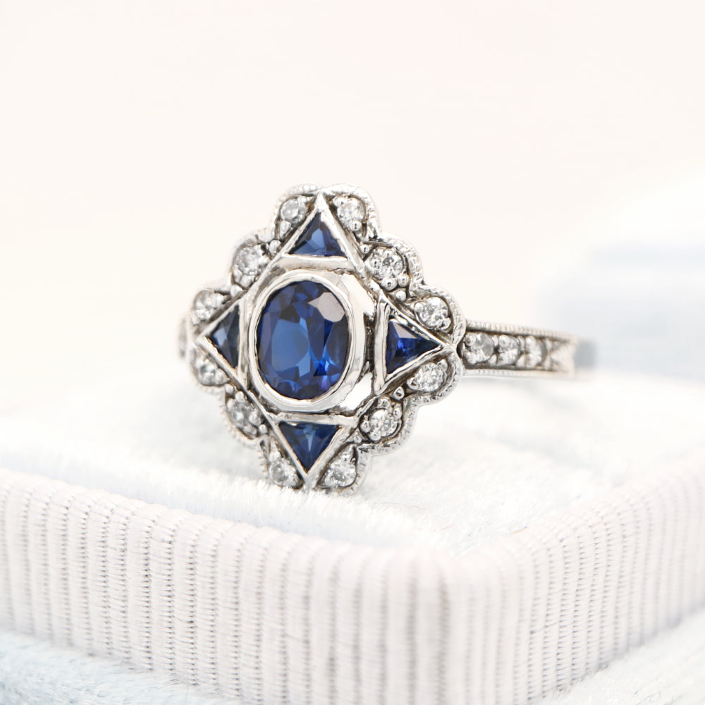 Art deco laboratory grown sapphire starburst with cz halo in sterling silver