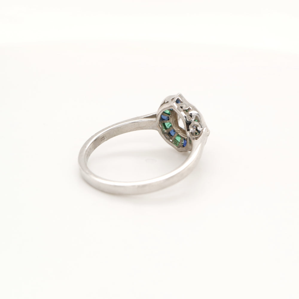 Diamond, emerald and sapphire target ring in white gold