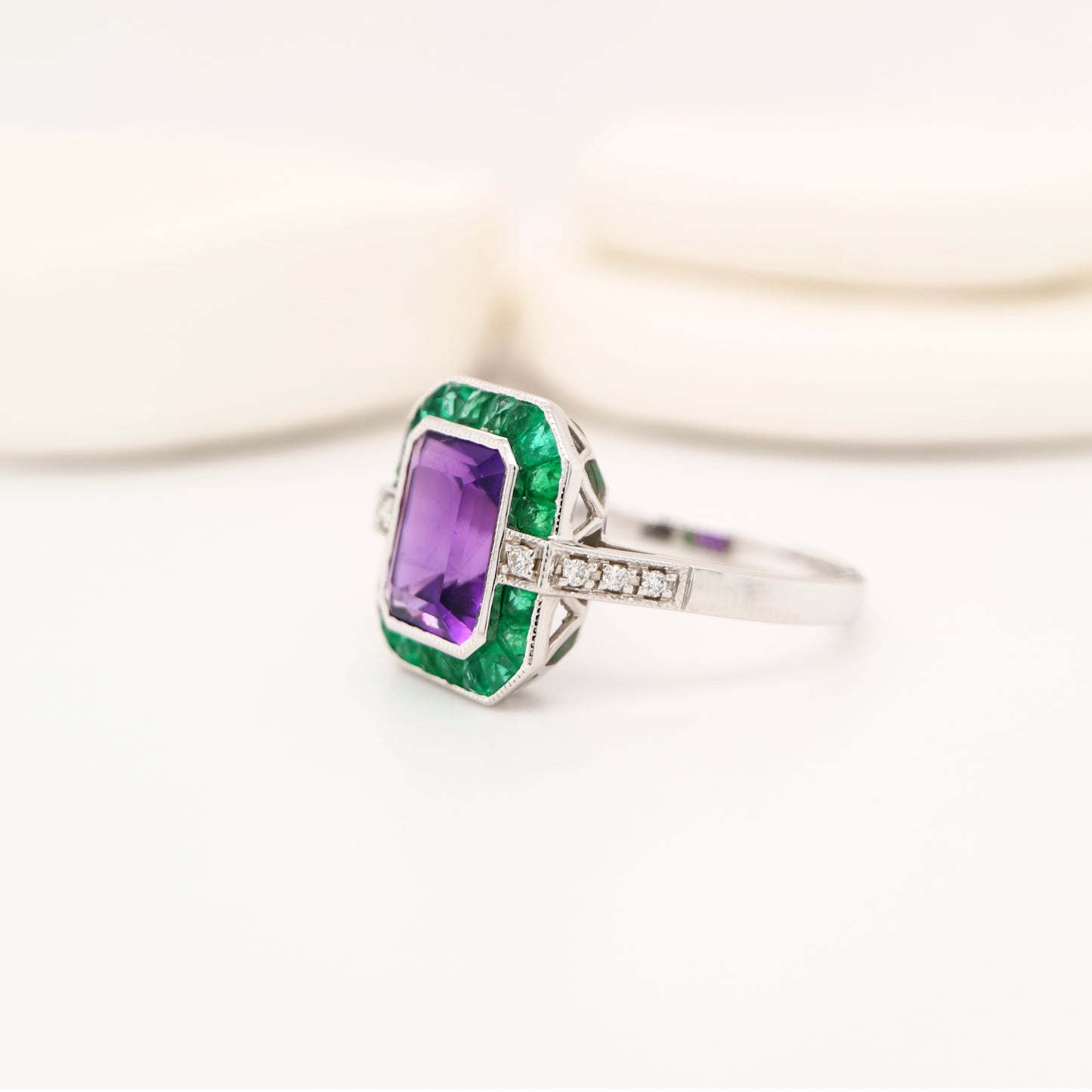 Amethyst and emerald cocktail ring in white gold with diamonds