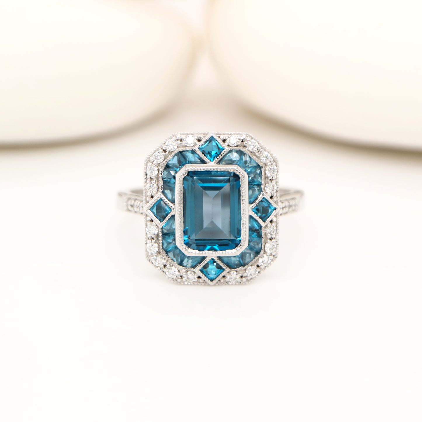 Art deco cocktail ring with london blue topaz and diamond in white gold