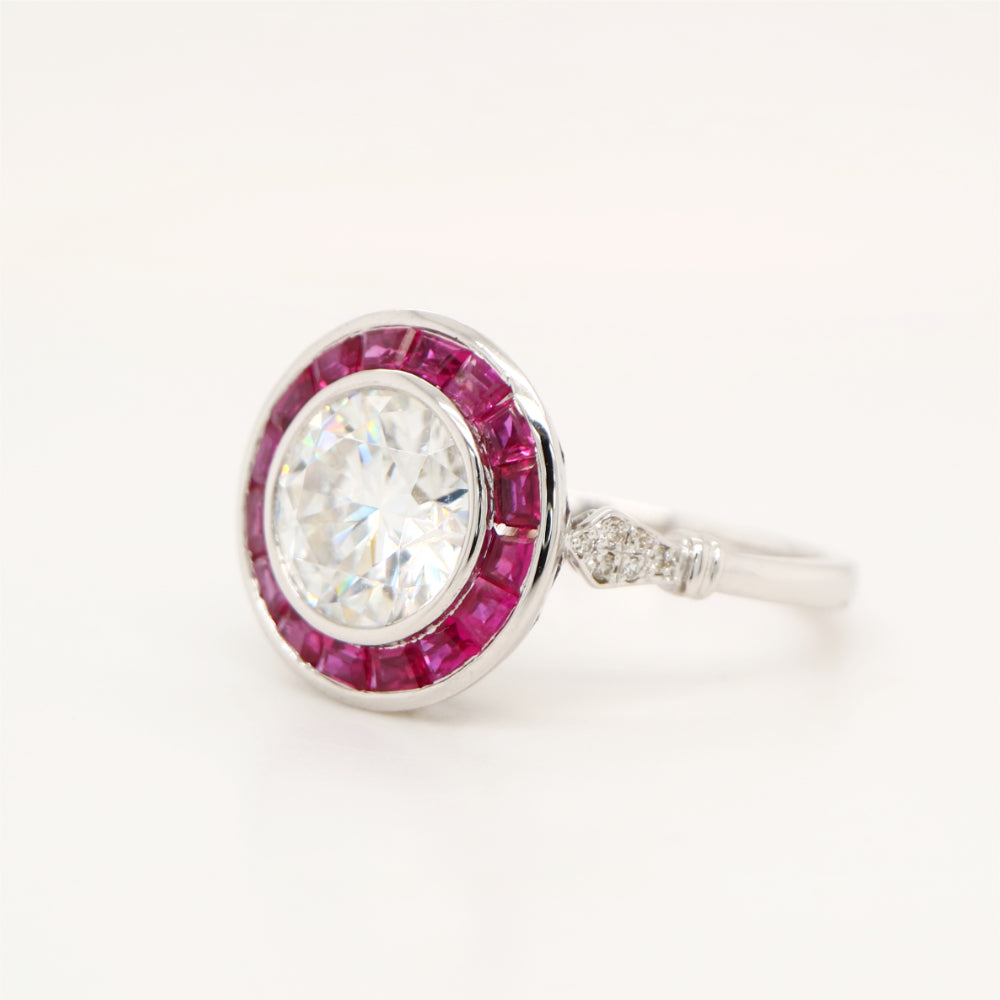 Moissanite with ruby halo ring in white gold
