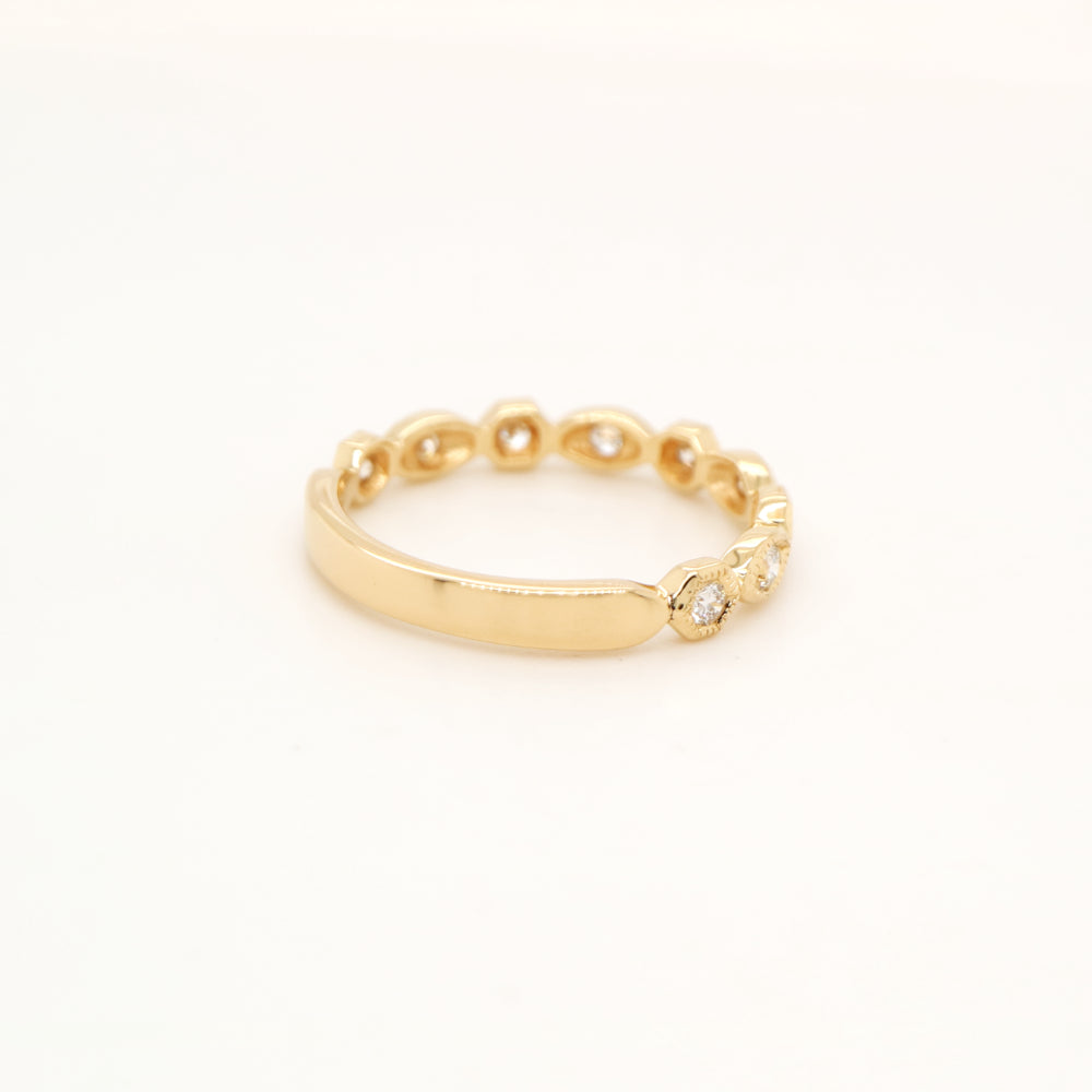 Art deco style half set band in yellow gold with natural diamonds