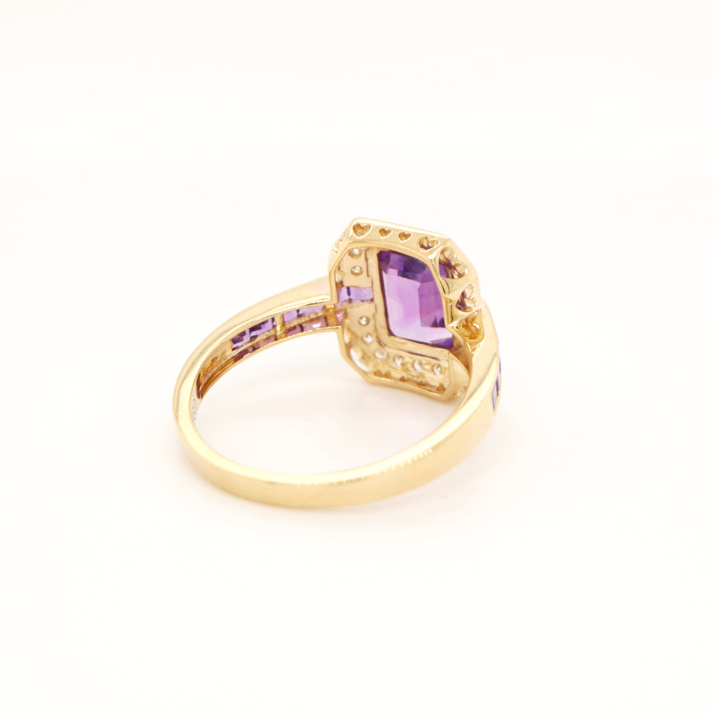 Vintage amethyst ring with diamond halo in yellow gold