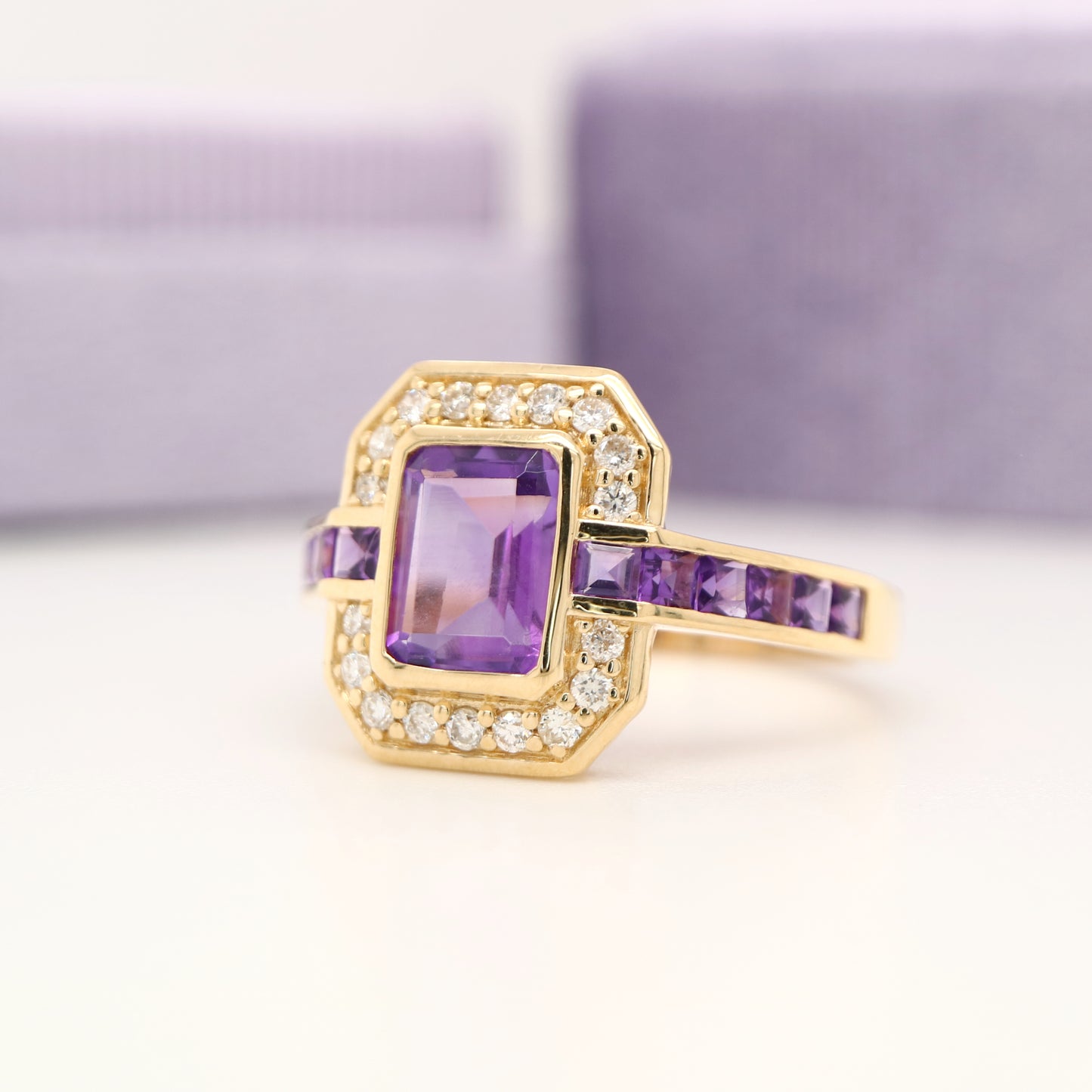 Vintage amethyst ring with diamond halo in yellow gold