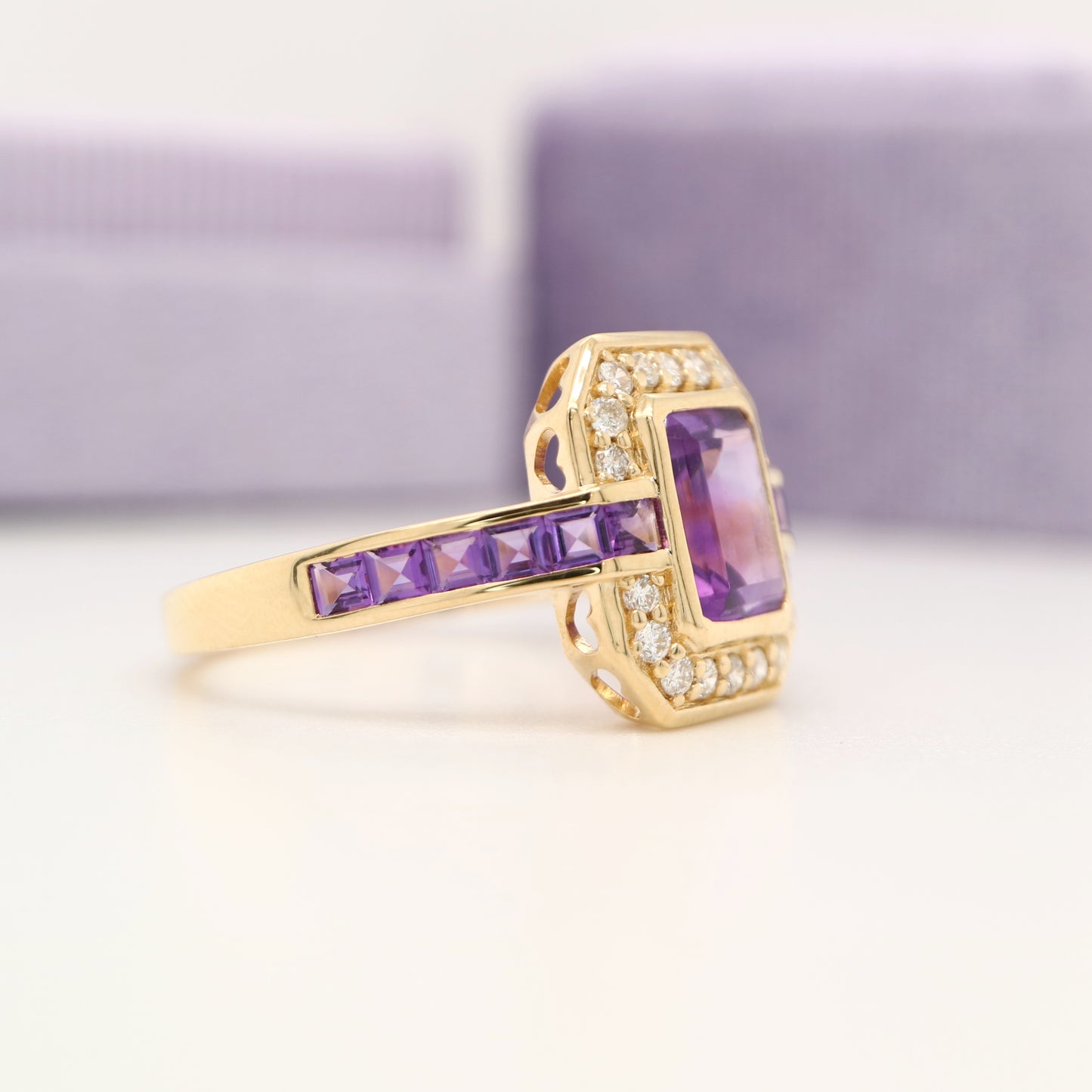 Vintage amethyst ring with diamond halo in yellow gold