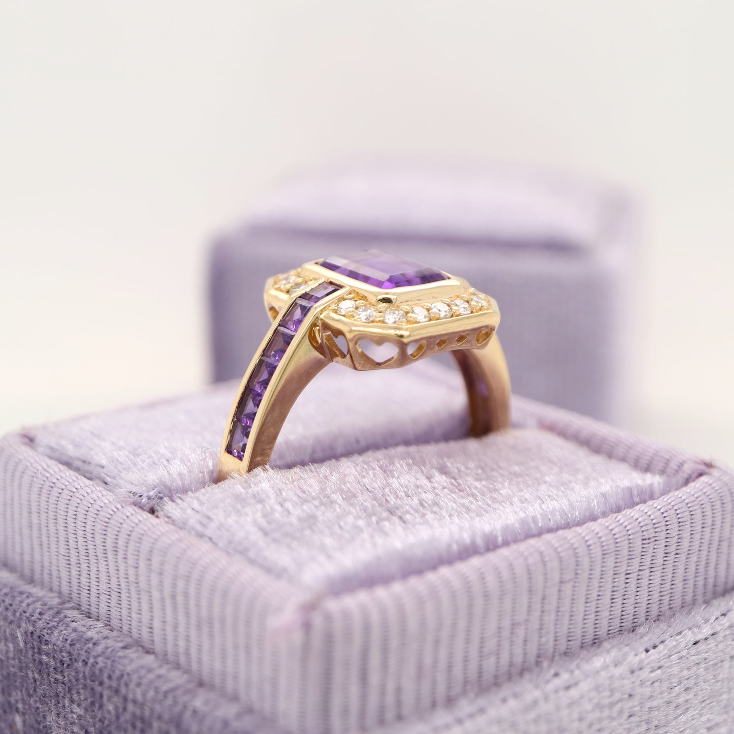 Vintage amethyst ring with diamond halo in yellow gold