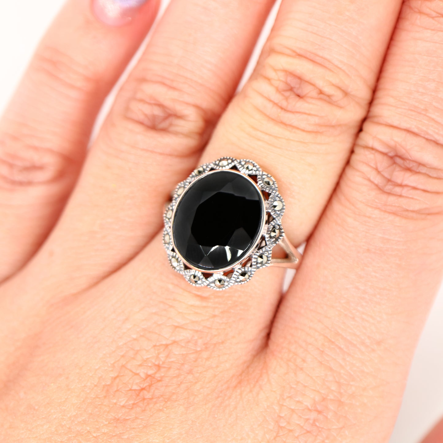 Art deco style black onyx ring with marcasite in scalloped edge in sterling silver