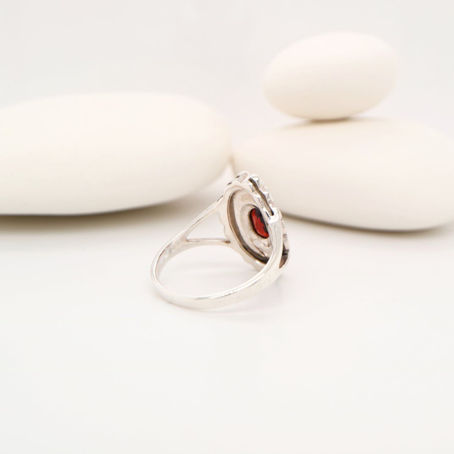 Marcasite shield with garnet ring in sterling silver