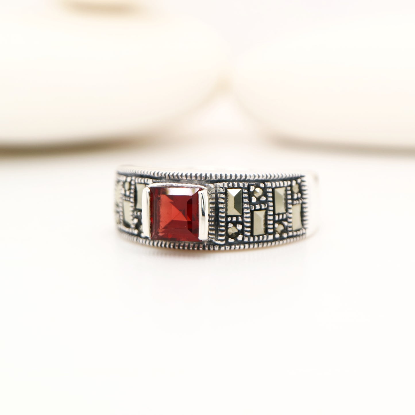 Marcasite band with garnet in sterling silver