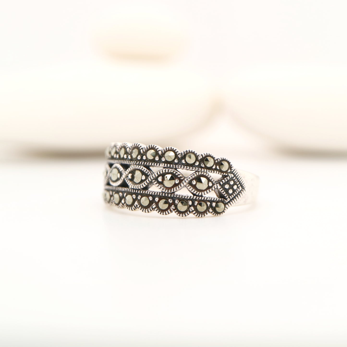 Scalloped edged marcasite ring in sterling silver