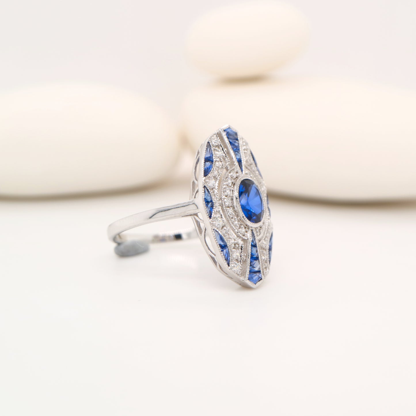 Sterling silver shield ring with Verneuil sapphire and CZ