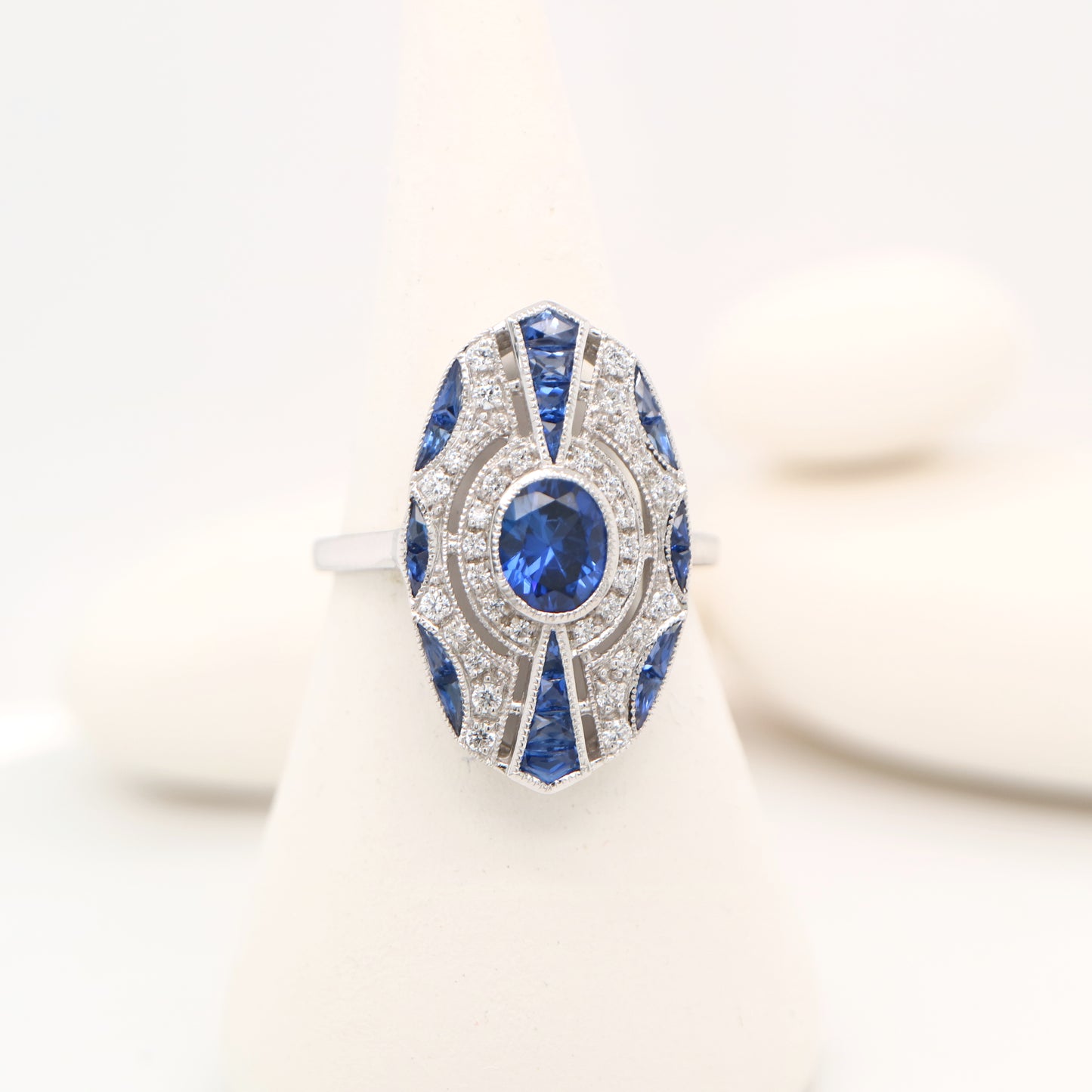 Sterling silver shield ring with Verneuil sapphire and CZ