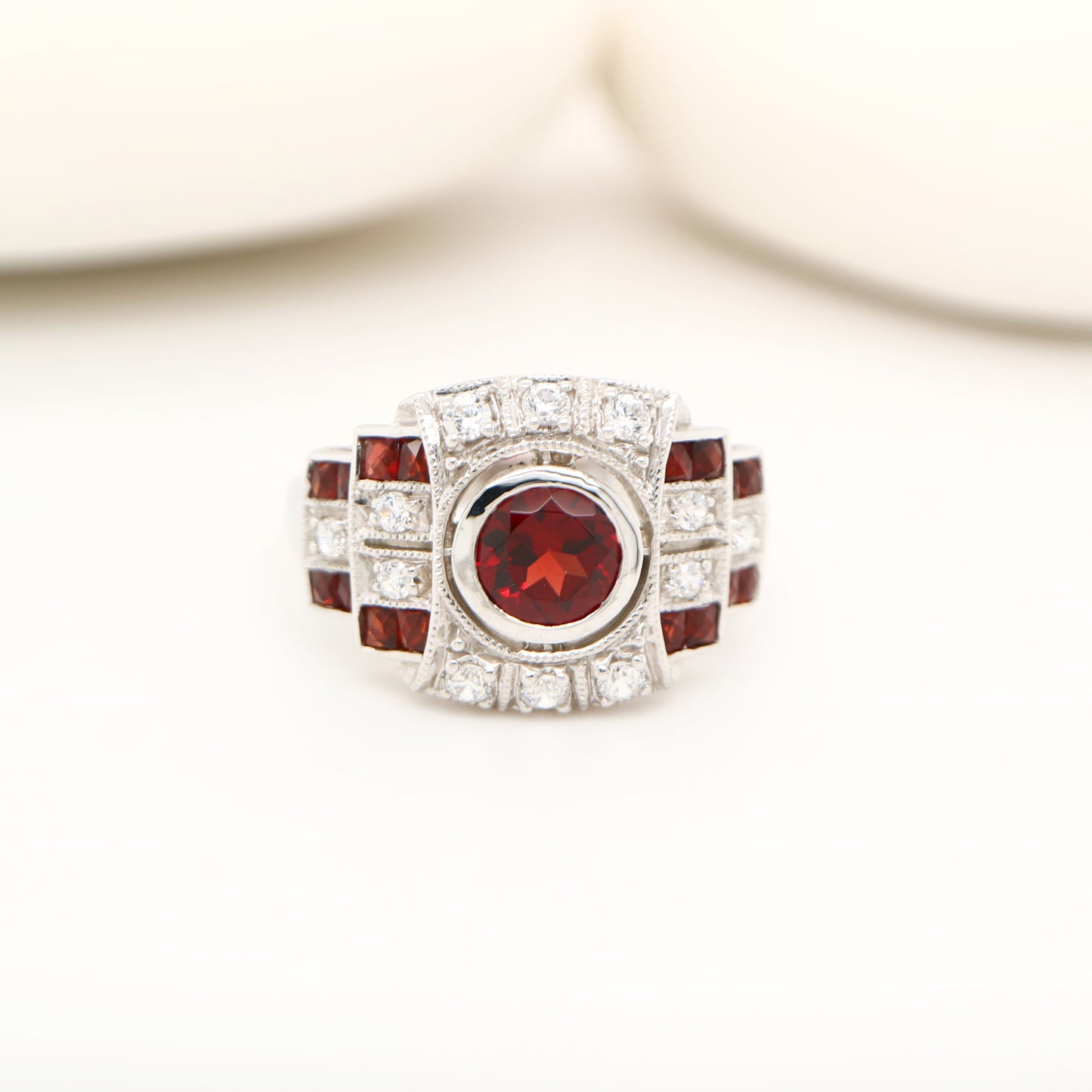 Art deco cocktail ring with garnet and cz in sterling silver