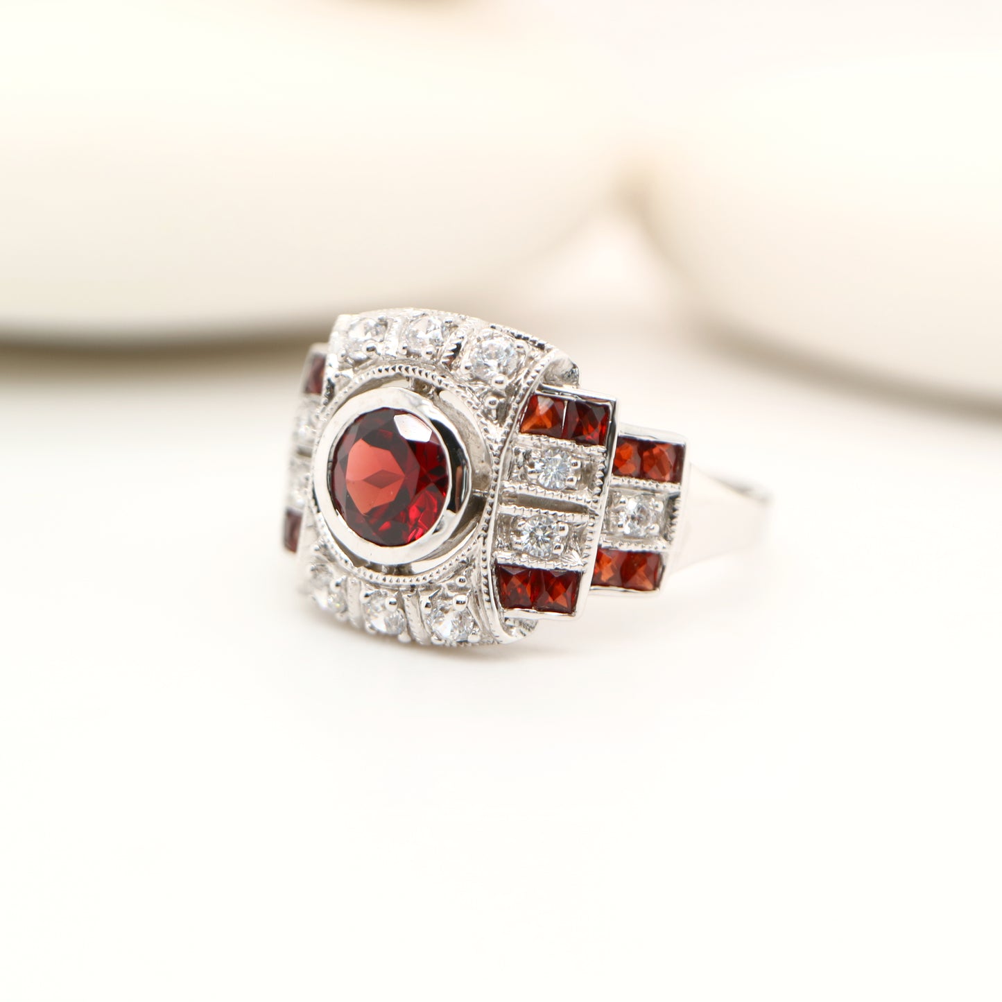 Art deco cocktail ring with garnet and cz in sterling silver