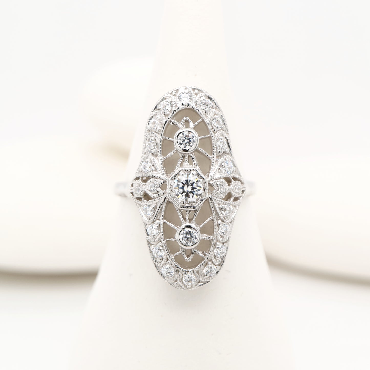 Cocktail halo ring with cubic zirconia in sterling silver